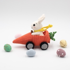 Easter bunny in carrot car