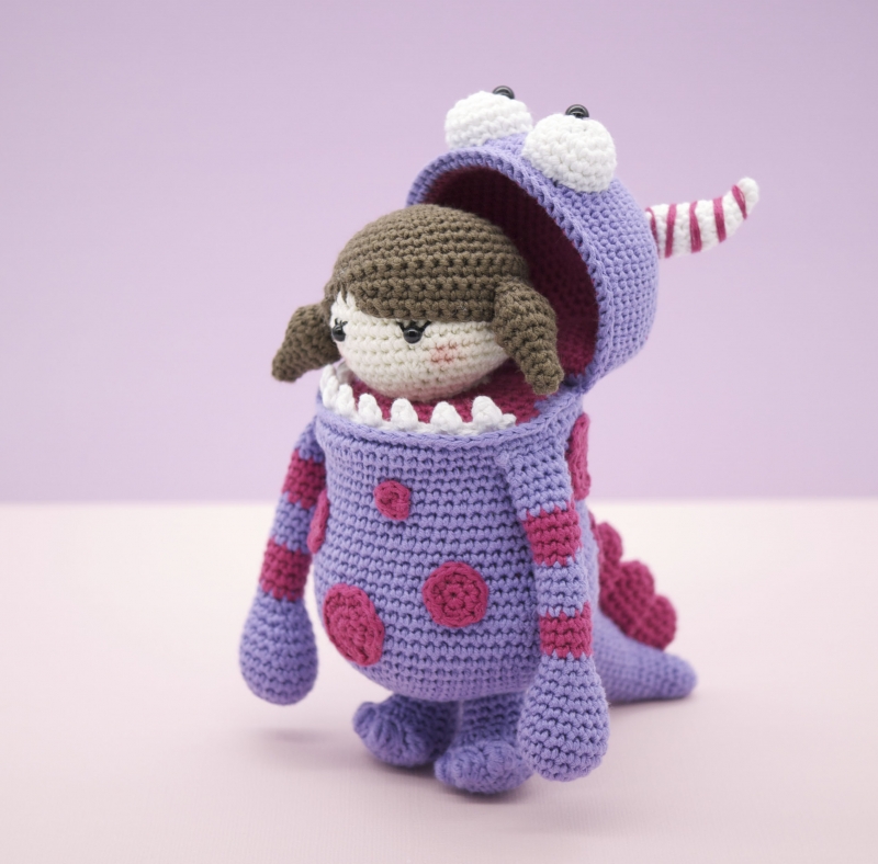 Little Ella in her monster suit amigurumi pattern - Amigurumi.com